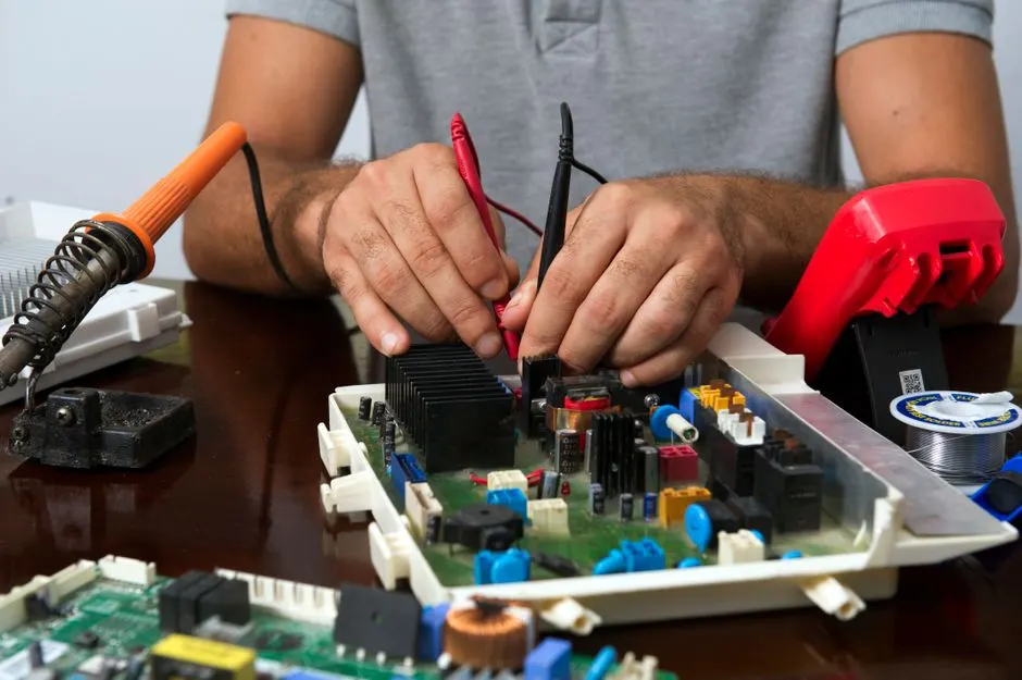 Experienced Appliance repair professionals at work